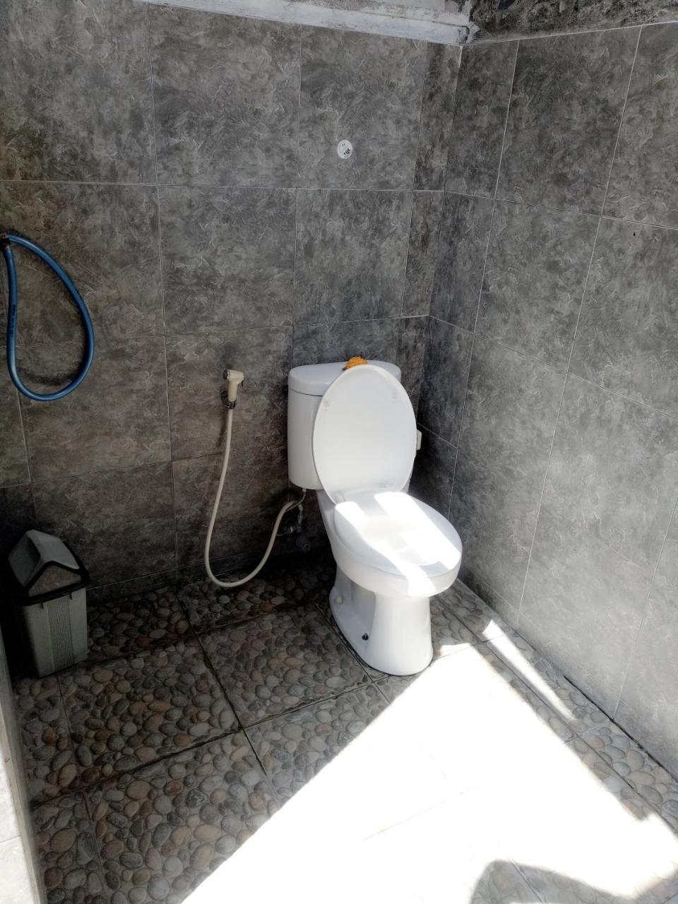 לינה וארוחת בוקר אובוד Suandi House מראה חיצוני תמונה
