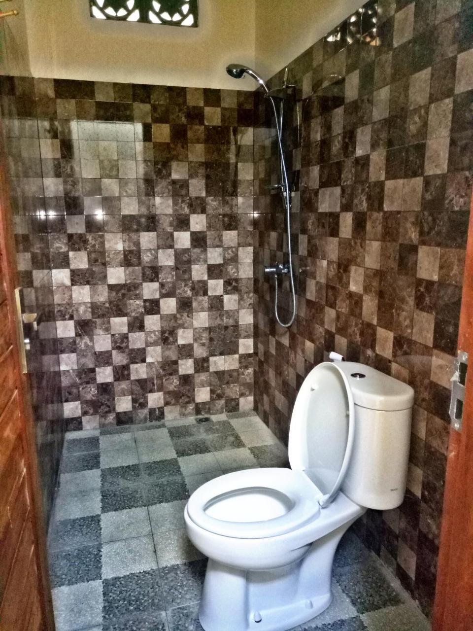 לינה וארוחת בוקר אובוד Suandi House מראה חיצוני תמונה